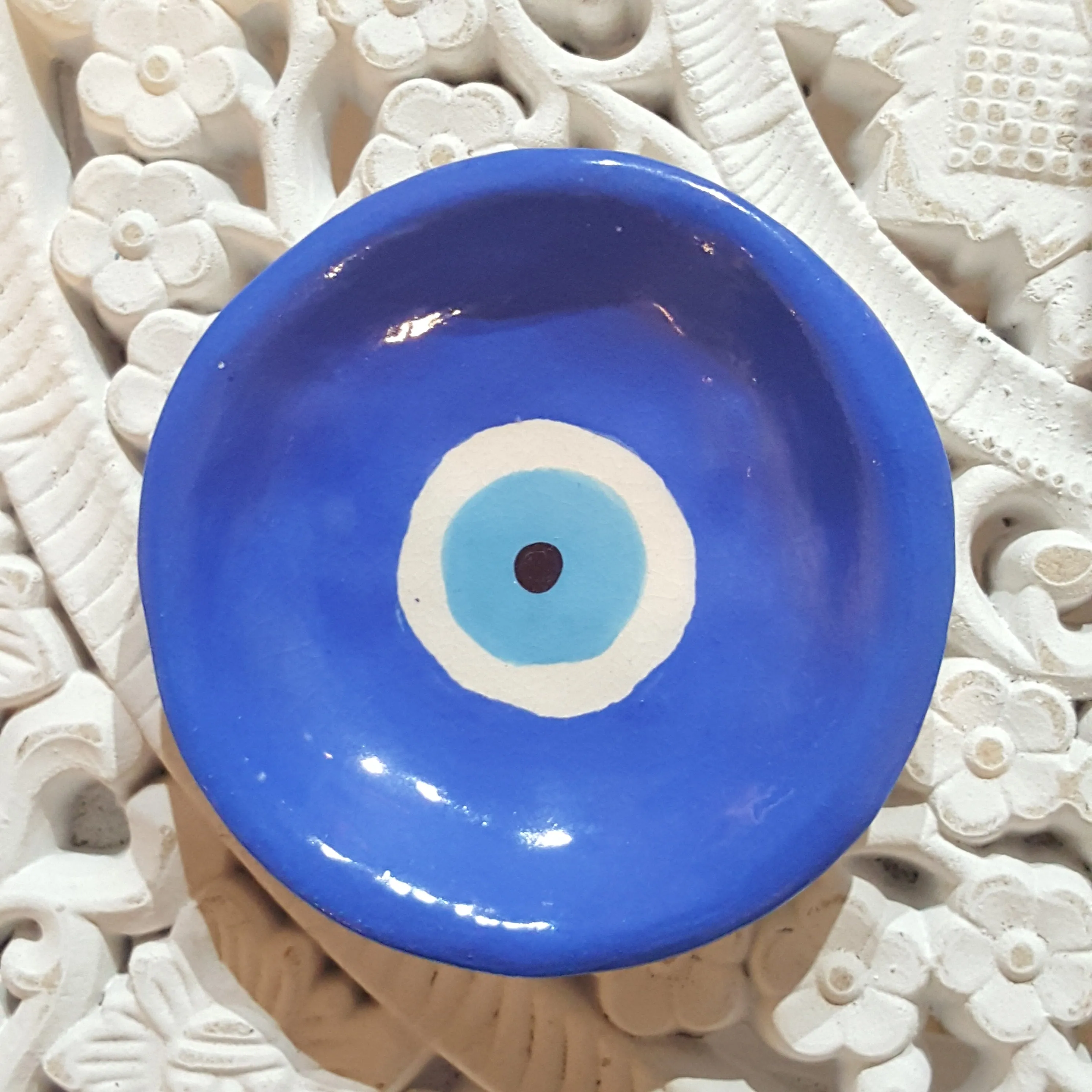 Ceramic trinket dish evil eye design in cobalt blue